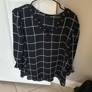 Black and white blouse. See through